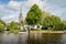 Picturesque dutch tourist village Broek in Waterland seen from the boat