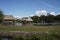 Picturesque and exotic lagoon with clean water El Milagro, loggon milagros with wooden house and thatched roof stilt houses Amazon