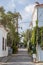 Picturesque and floral church street of Tenedos Bozcaada Island by Aegean Sea