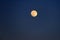 Picturesque full moon against a sky. Full planet moon with craters, text space. Night landscape for weather forecast