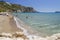Picturesque golden sandy beach in Kalamaki situated on Laganas bay of Zakynthos island on Ionian Sea, Greece.