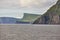 Picturesque green cliffs landscape and atlantic ocean. Faroe islands. Stora Dimun