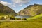 Picturesque green landscape with black houses in Faroe islands. Saksun