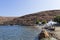 Picturesque gulf with a small white church in Kythnos island, Cyclades, Greece