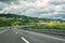 Picturesque highway in Croatia autocesta A, the main automobile road. Scenic daytime landscape with fantastic clouds