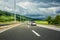 Picturesque highway in Croatia autocesta A, the main automobile road. Scenic daytime landscape with fantastic clouds