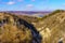 Picturesque hilly valley of Eastern Europe. Background with copy space