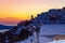 Picturesque Imerovigli resort village at twilight Santorini island Greece