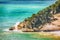 Picturesque islets Faraglioni di Puglia in summer Adriatic sea bay Baia Delle Zagare