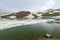 Picturesque Lake Kari in the mountains of Armenia covered in snow