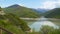 Picturesque lake among mountains covered with forest