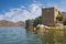 Picturesque lake with ruined fort on small island. View of National Park Lake Skadar. Montenegro