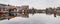 Picturesque landscape with beautiful traditional houses reflection in canal, Haarlem, Holland