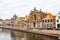 Picturesque landscape with beautiful traditional houses reflection in canal, Haarlem, Holland