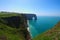 Picturesque landscape on the cliff of Etretat. la Manneporte natural rock arch wonder, cliff and beach