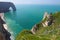 Picturesque landscape on the cliff of Etretat. la Manneporte natural rock arch wonder, cliff and beach.