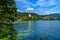 The picturesque landscape of a mountain lake Bled with the island and the famous Church of the Assumption of Maria