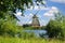 Picturesque landscape with old mill and lake