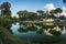 Picturesque landscape with reflections in green river, Kenya