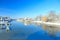 The picturesque landscape of the river snowy shore