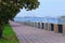 Picturesque landscape view of cobble stone pathway with autumn colored trees along the Dnieper River.