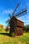 Picturesque landscape view of old windmill. Typical building of ancient Ukrainian village.