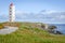 Picturesque lighthouse KjÃ¸lnes near BerlevÃ¥g, Finnmark, Norway