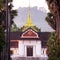 Picturesque of Luang Prabang National Museum and palm tree lined at dusk