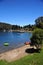 picturesque manzano bay, with luxurious hotels and apartments with docks and boats on lake nahuel h