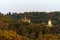 Picturesque morning autumn landscape view of famous Kyiv`s hills against blue sky.