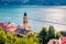 Picturesque morning cityscape of Laglio town with spire of S.Giorgio church, Province of Como, Lombardy region, Italy, Europe. Su