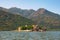 Picturesque mountain landscape with lake and ruined fort on small island. View of Lake Skadar. Montenegro