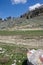 Picturesque mountain landscape. Marking of route is marked on a large stone - red and white marks. Spring. Lycian Way. Turkey.