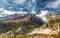 Picturesque mountain panorama. Glacier river flowing though a valley.