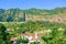 Picturesque mountain village Sao Vicente in Madeira, Portugal. The small city is surrounded by steep green hills. Terraced fields