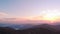 Picturesque multi-colored sky over the mountains.