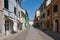 A picturesque narrow street in Cesenatico on a summer day, Emilia Romagna