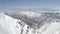 Picturesque natural top view on village of Krasnaya Polyana and mount Achishkho surrounded by mist