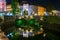 Picturesque night view of illuminated Triple Bridge and Mayer Palace in Ljubljana, Slovenia