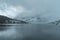 Picturesque Nordic Fjord Landscape with Mist Cloud