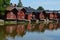 Picturesque old town of Porvoo, Finland - view of weathered coastal barns on the riverside