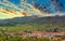 Picturesque panorama of Starigrad town on the island of Hvar. Seen from a nearby hill. Old church belltower rising above the