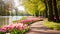 A picturesque pathway adorned with an array of vibrant flowers, meandering alongside a serene lake, Panoramic view to spring