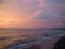 Picturesque Pink sunset on lake beach sea sand beautiful colors in the sky clouds