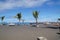 Picturesque Playa JardÃ­n beach on the Spanish Canary Island Tenerife with black volcanic sand blue ocean water and green palm