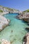 Picturesque Porto Limnionas rocky beach. It is situated on west coast of Zakynthos island, Greece.