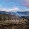 Picturesque pre sunrise morning above late autumn mountain countryside. Ukraine, Carpathian Mountains, Hoverla and Petros tops in