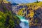 Picturesque river Kawarau. The river with bright green water.