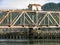 Picturesque river landscape with old railroad bridge