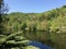 Picturesque river valley on a bright cloudless summer day